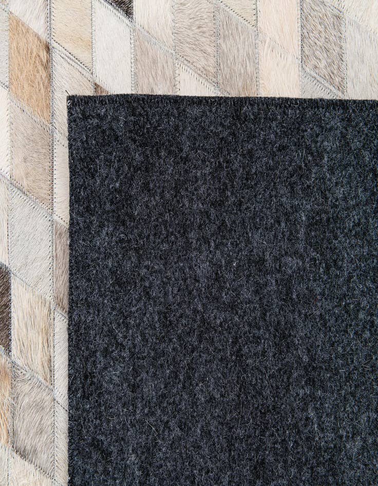 Detail image of 4' 1 x 6' Cowhide Stocks Rug