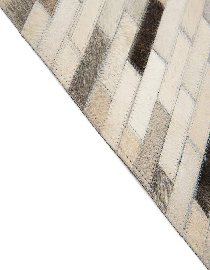 Detail image of 3' 11 x 5' 10 Cowhide Stocks Rug