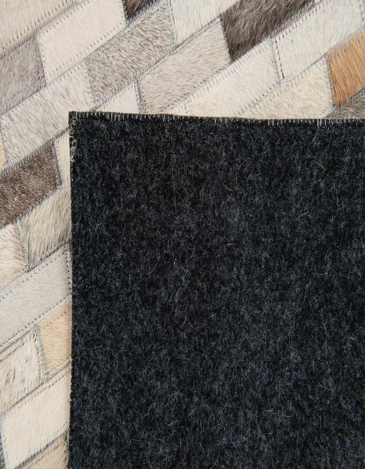 Detail image of 3' 11 x 5' 10 Cowhide Stocks Rug