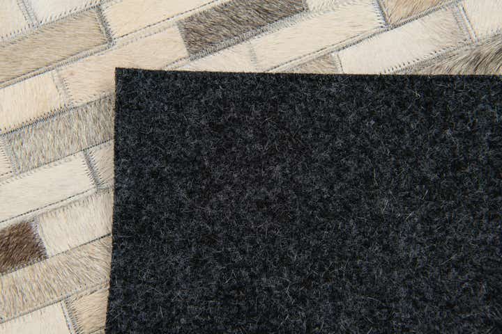 4' x 5' 11 Cowhide Stocks Rug