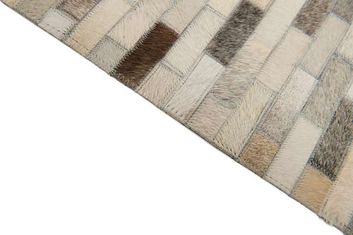 4' x 5' 11 Cowhide Stocks Rug