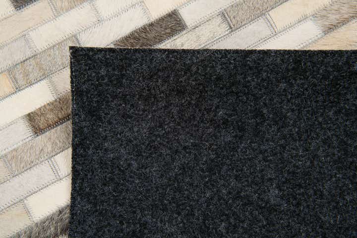 4' x 5' 11 Cowhide Stocks Rug