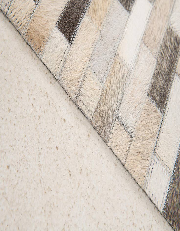 Detail image of 4' x 5' 11 Cowhide Stocks Rug