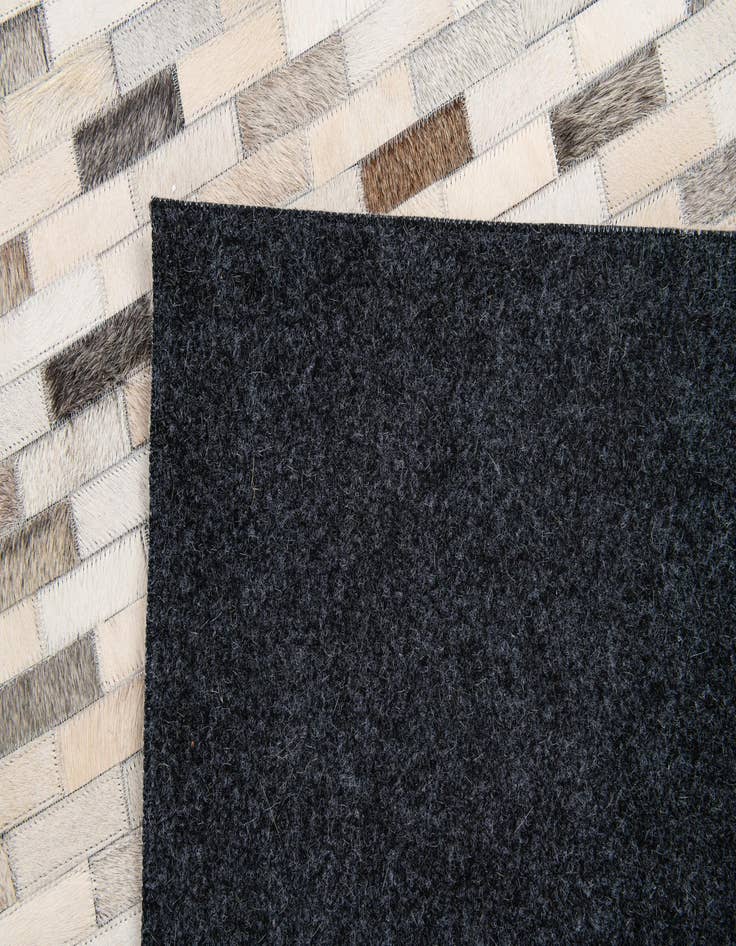 Detail image of 4' x 5' 11 Cowhide Stocks Rug