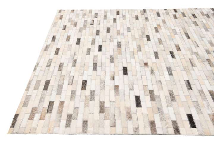 3' 11 x 6' 1 Cowhide Stocks Rug
