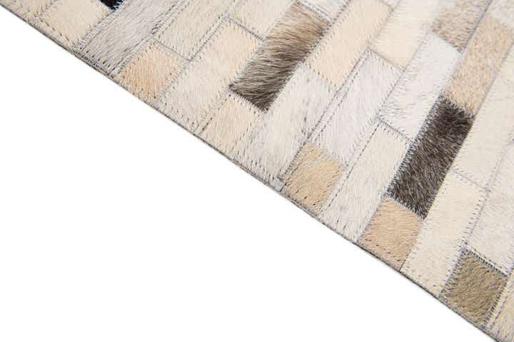 3' 11 x 6' 1 Cowhide Stocks Rug