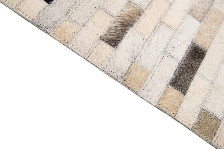 Detail image of 3' 11 x 6' 1 Cowhide Stocks Rug
