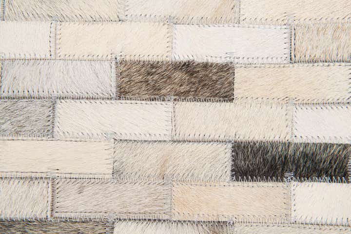 3' 11 x 6' 1 Cowhide Stocks Rug