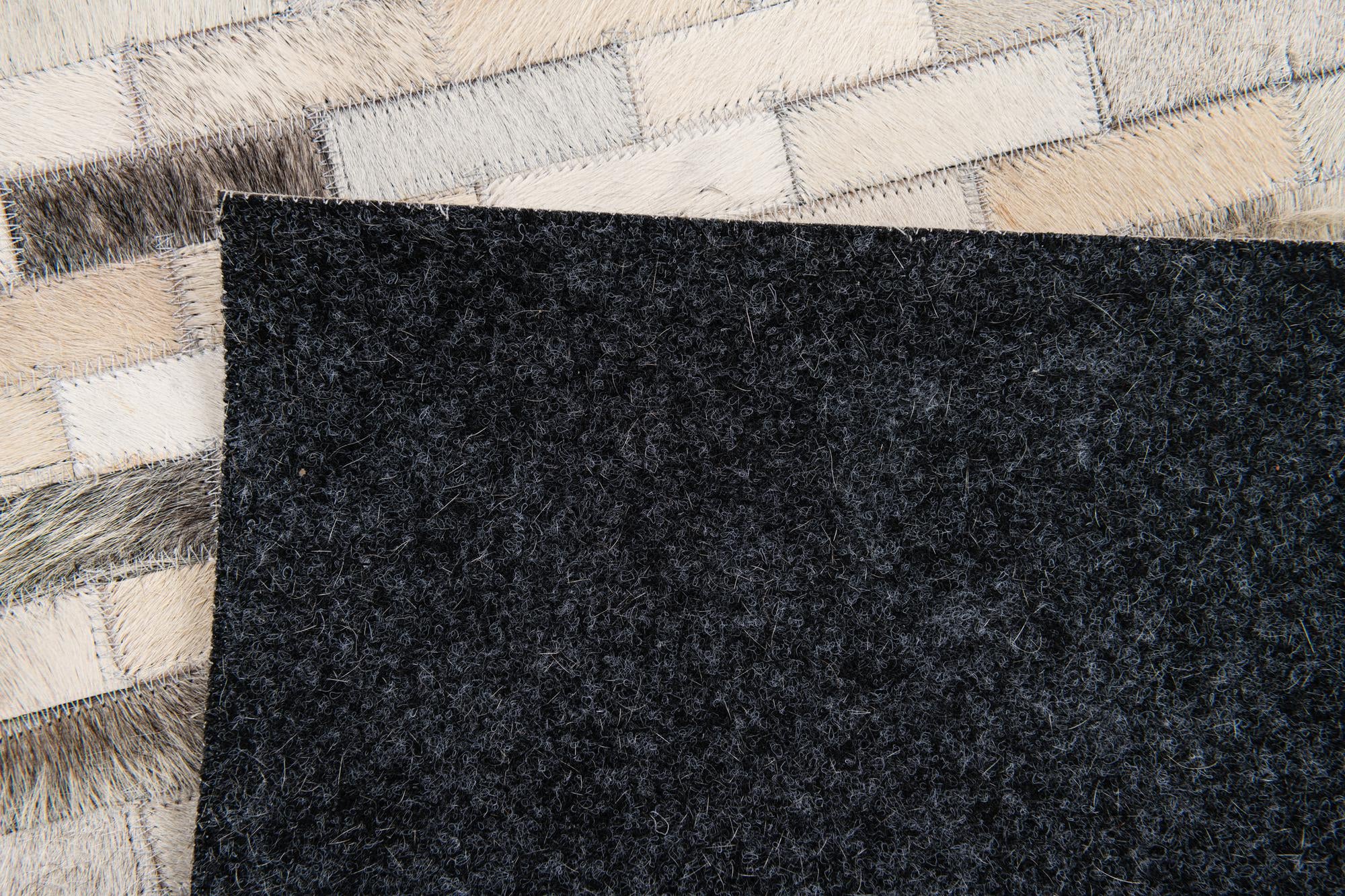 3' 11 x 6' 1 Cowhide Stocks Rug
