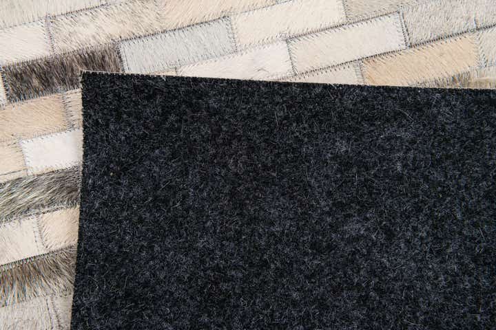 3' 11 x 6' 1 Cowhide Stocks Rug