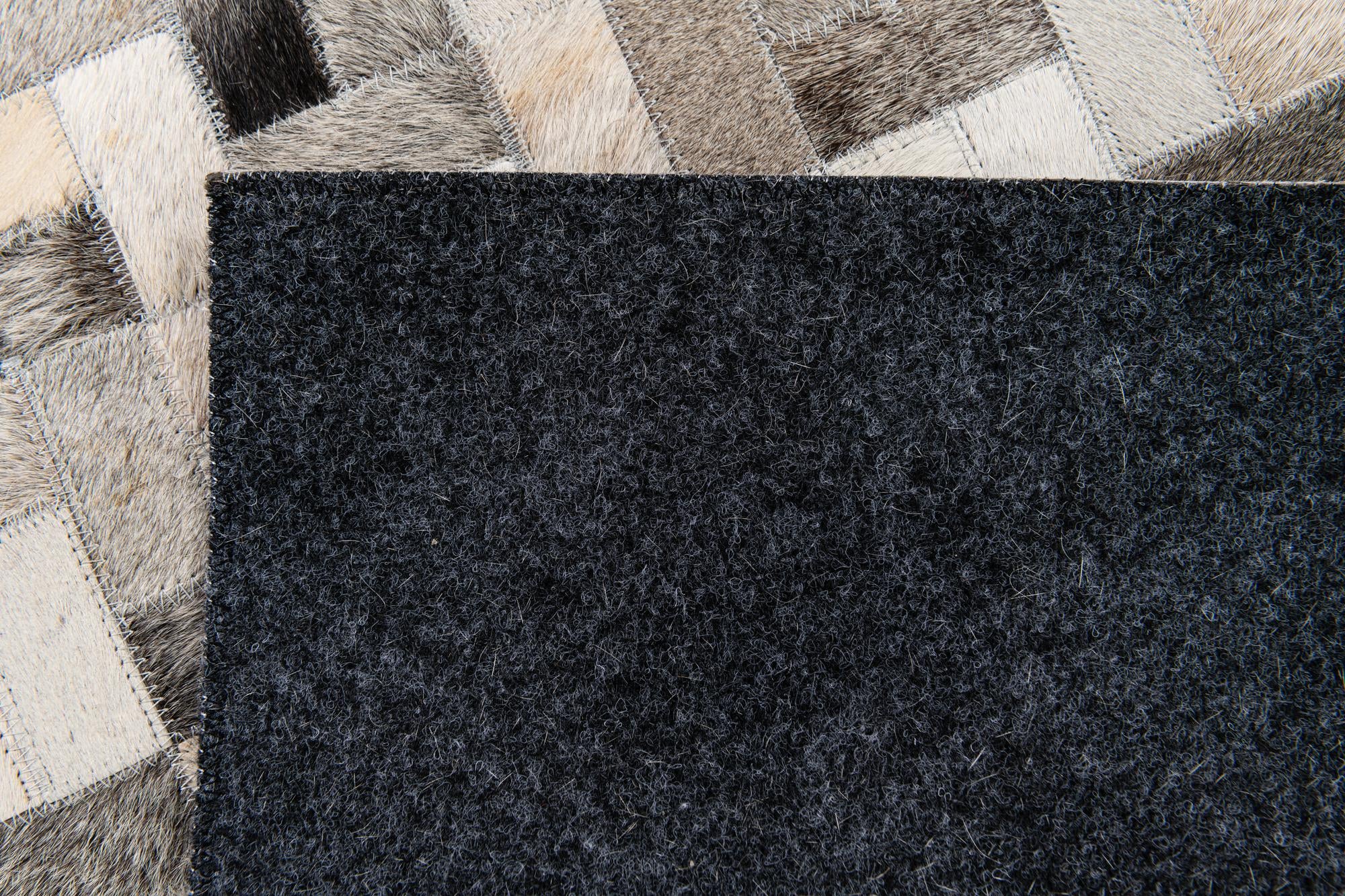4' 1 x 5' 10 Cowhide Stocks Rug