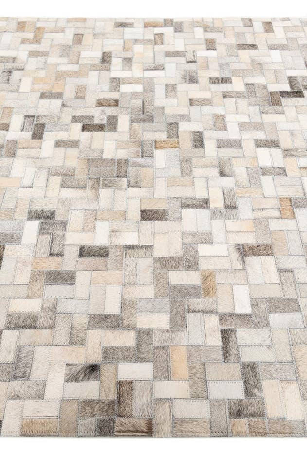 Detail image of 4' 1 x 6' 1 Cowhide Stocks Rug