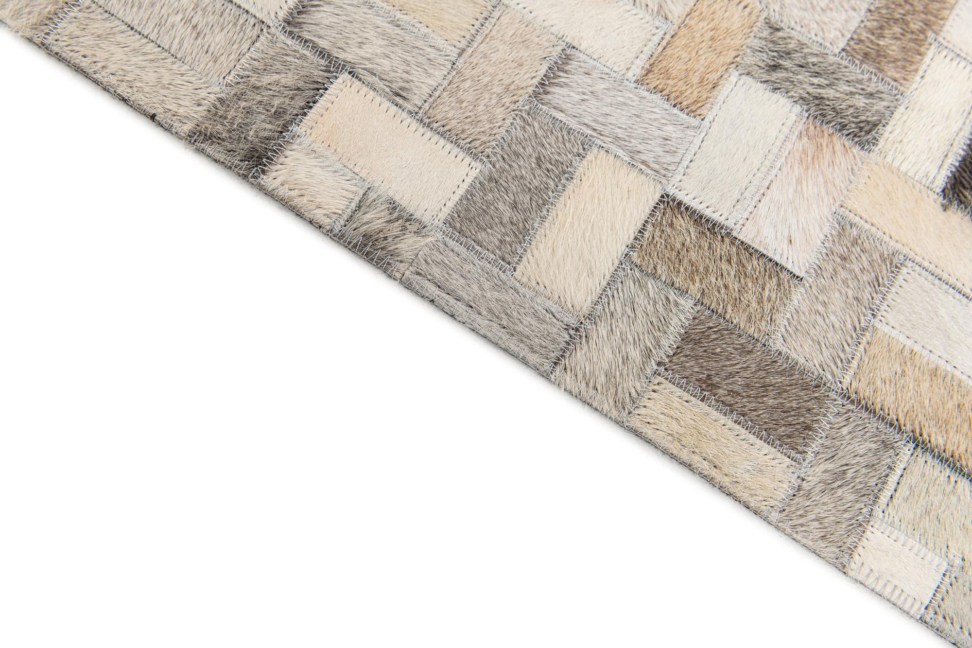 4' 1 x 5' 10 Cowhide Stocks Rug