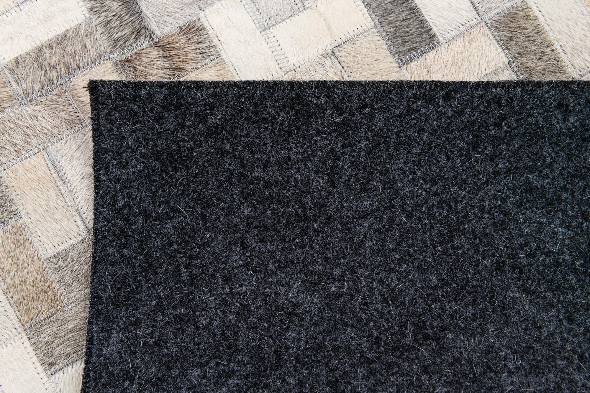 4' 1 x 5' 10 Cowhide Stocks Rug