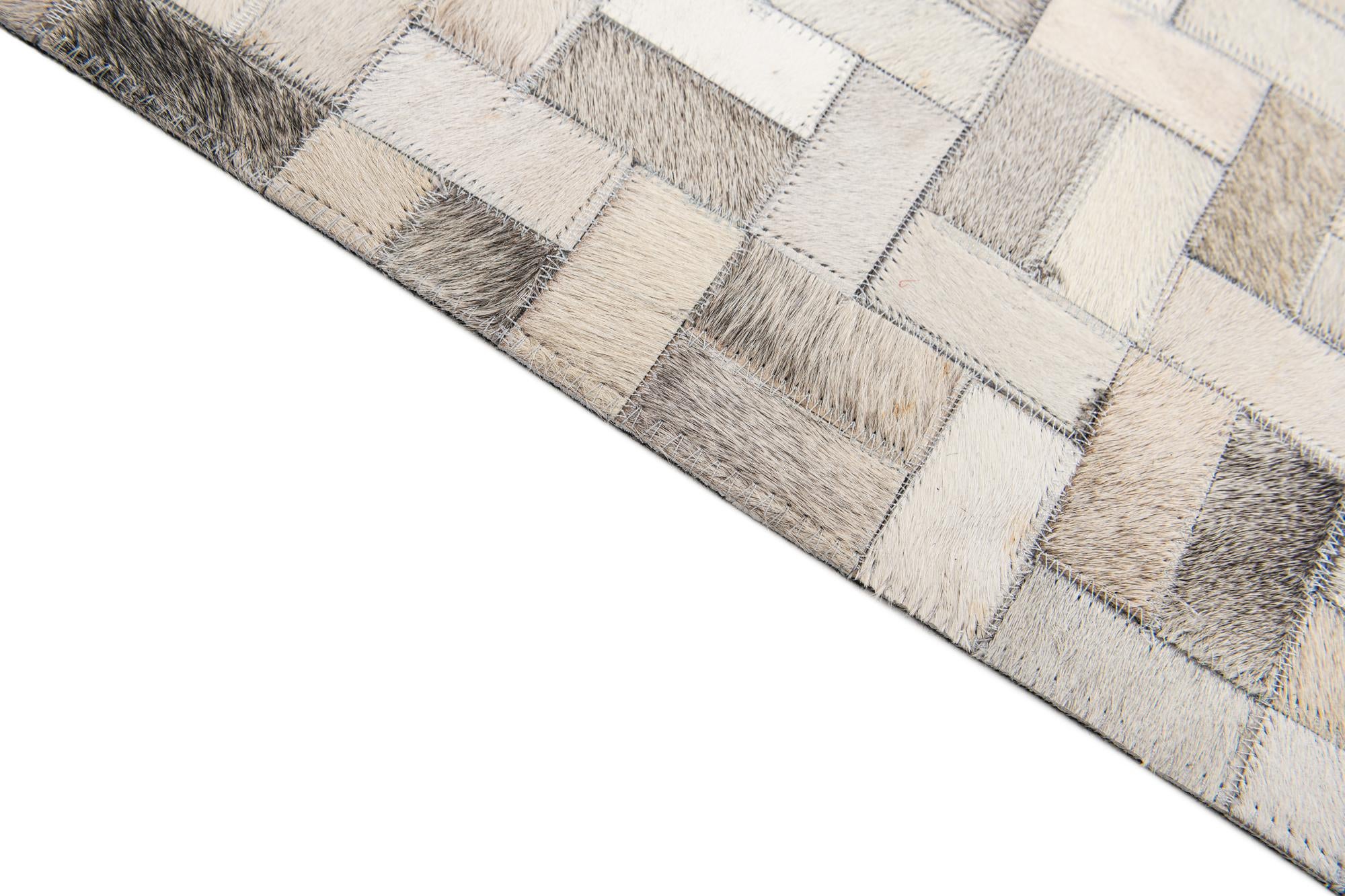 6' 8 x 9' 10 Cowhide Stocks Rug