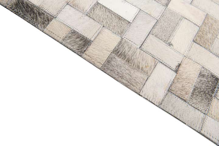 6' 8 x 9' 10 Cowhide Stocks Rug
