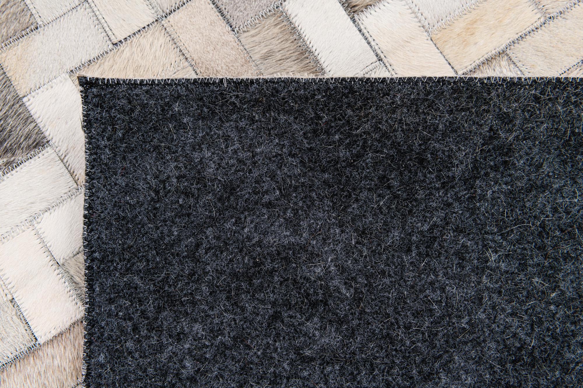 6' 8 x 9' 10 Cowhide Stocks Rug