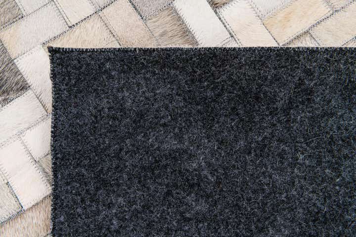 6' 8 x 9' 10 Cowhide Stocks Rug