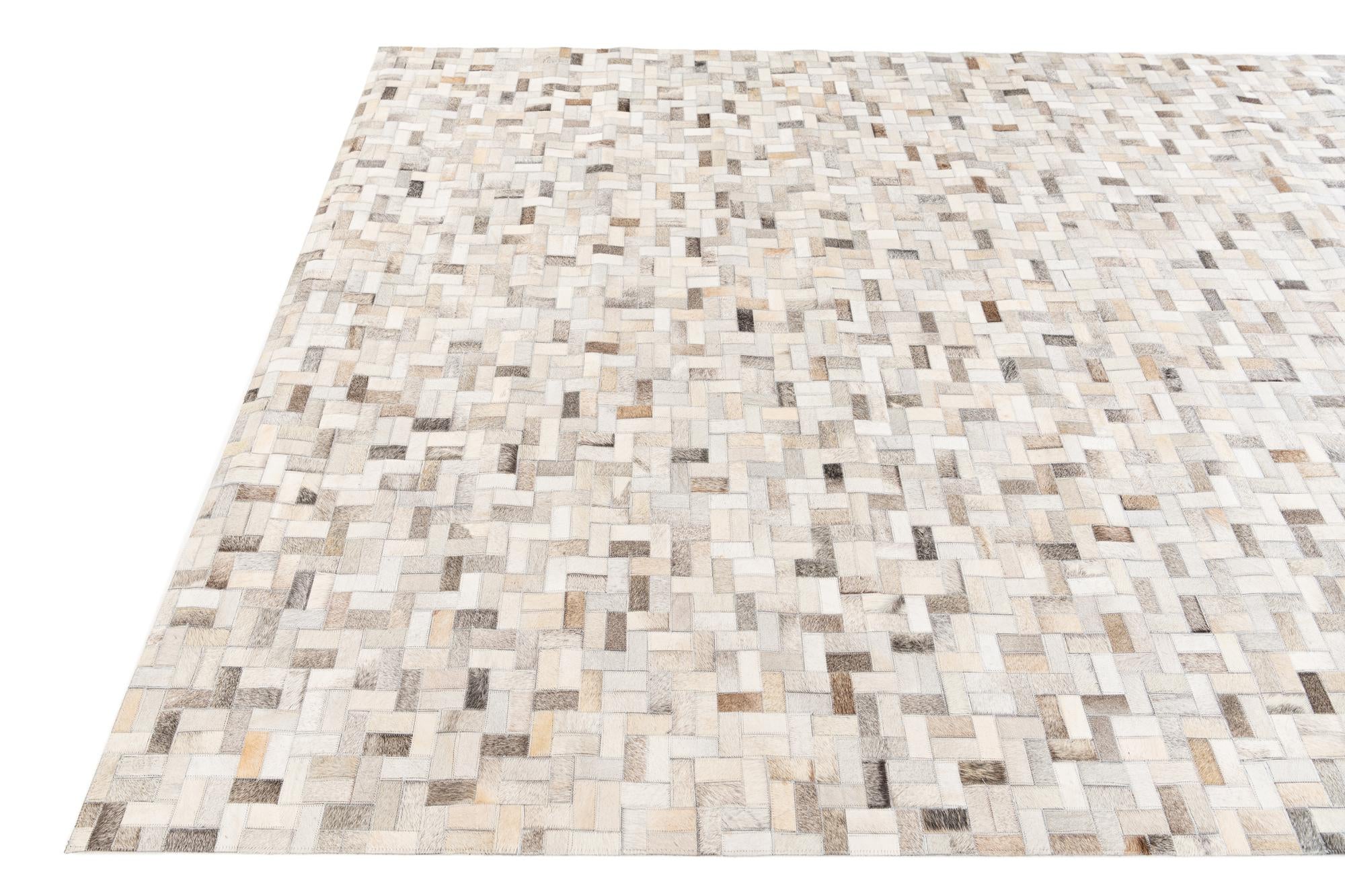 6' 7 x 9' 9 Cowhide Stocks Rug