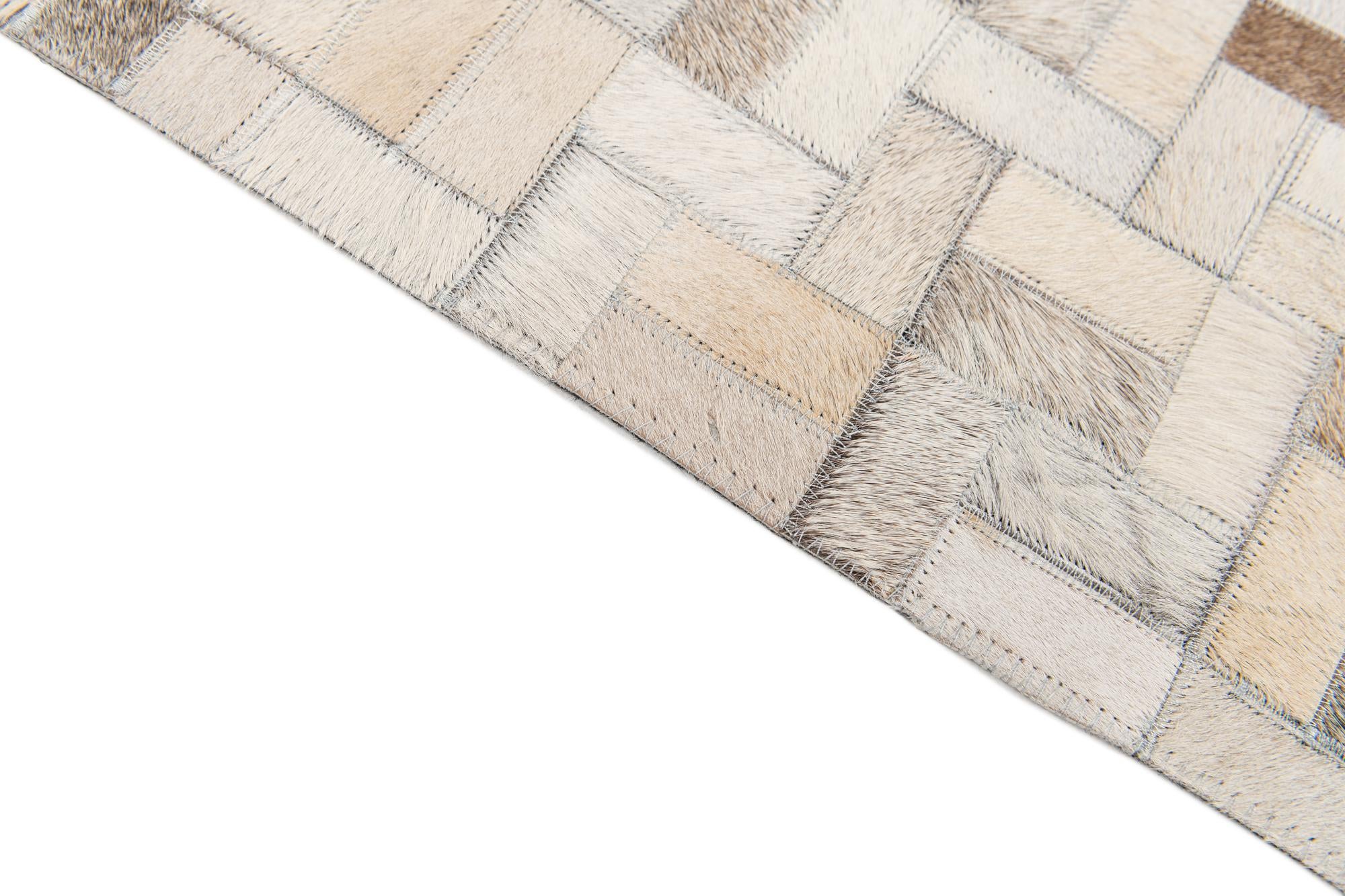 6' 7 x 9' 9 Cowhide Stocks Rug