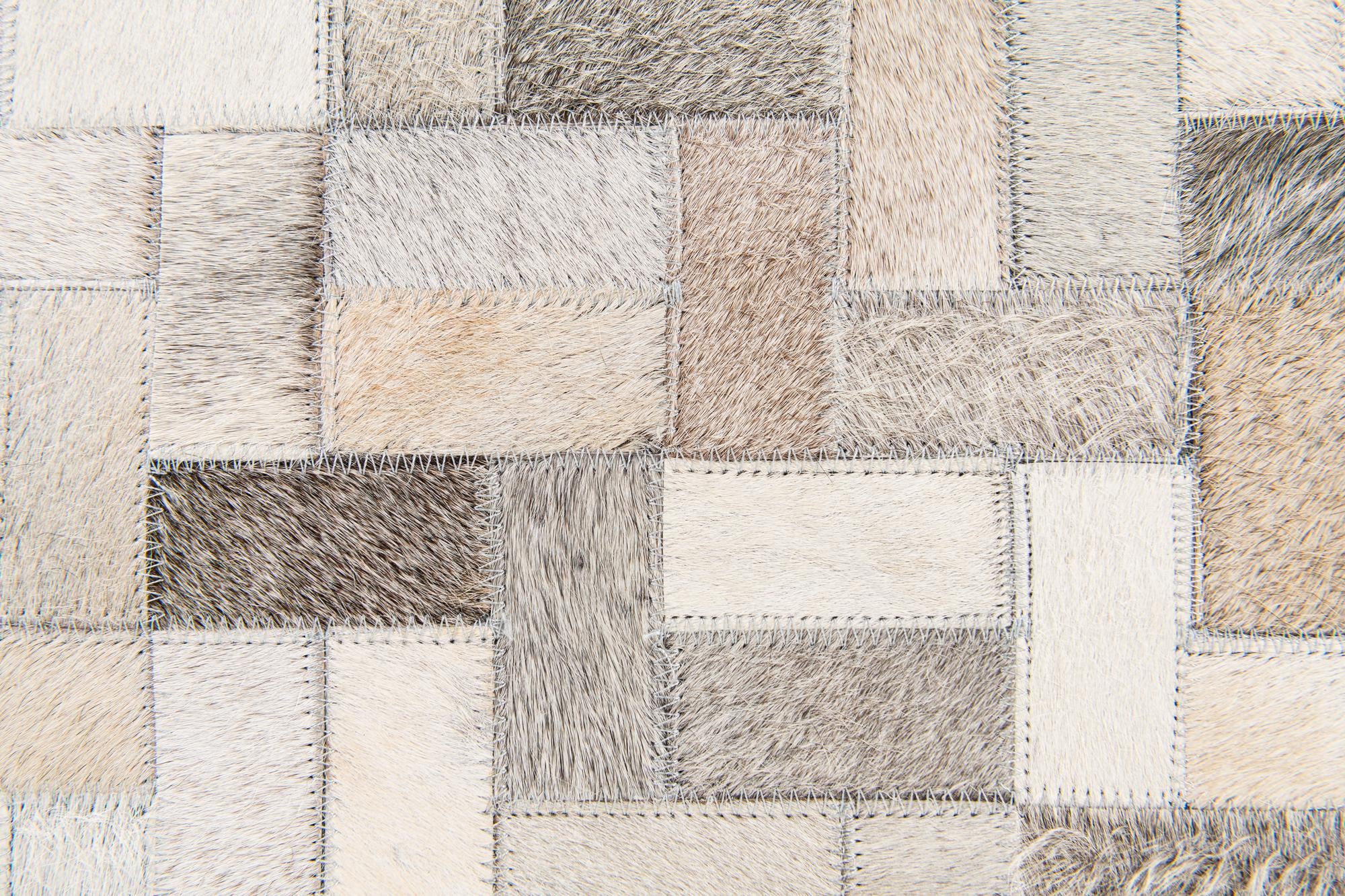 6' 7 x 9' 9 Cowhide Stocks Rug