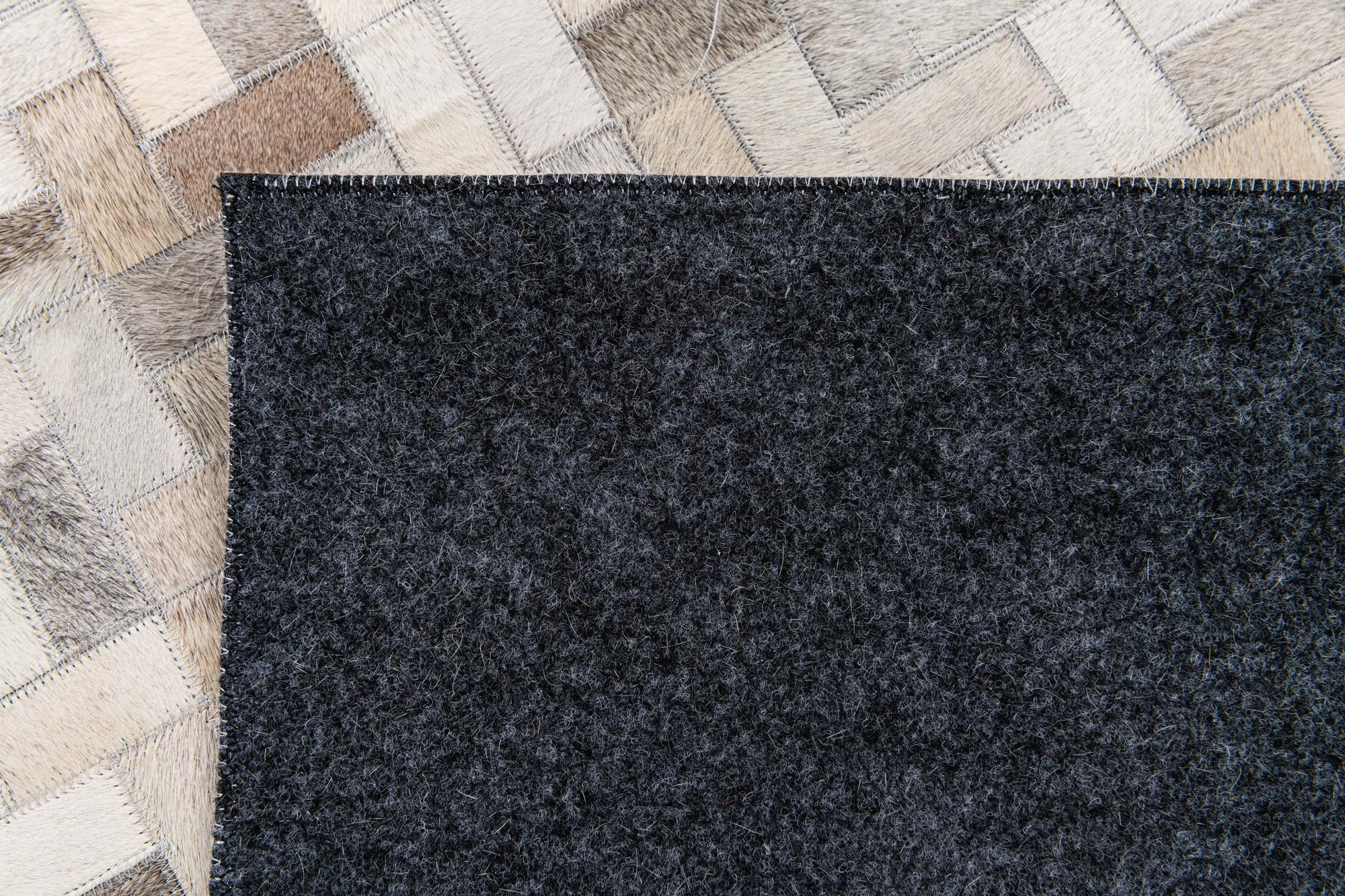 6' 7 x 9' 9 Cowhide Stocks Rug