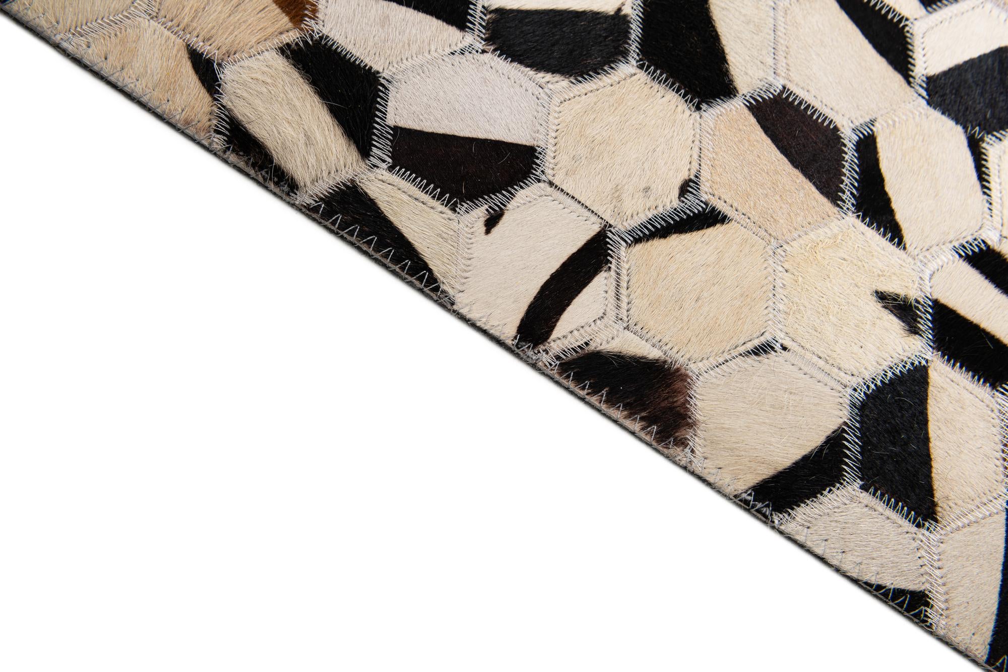 8' 1 x 9' 10 Cowhide Stocks Rug