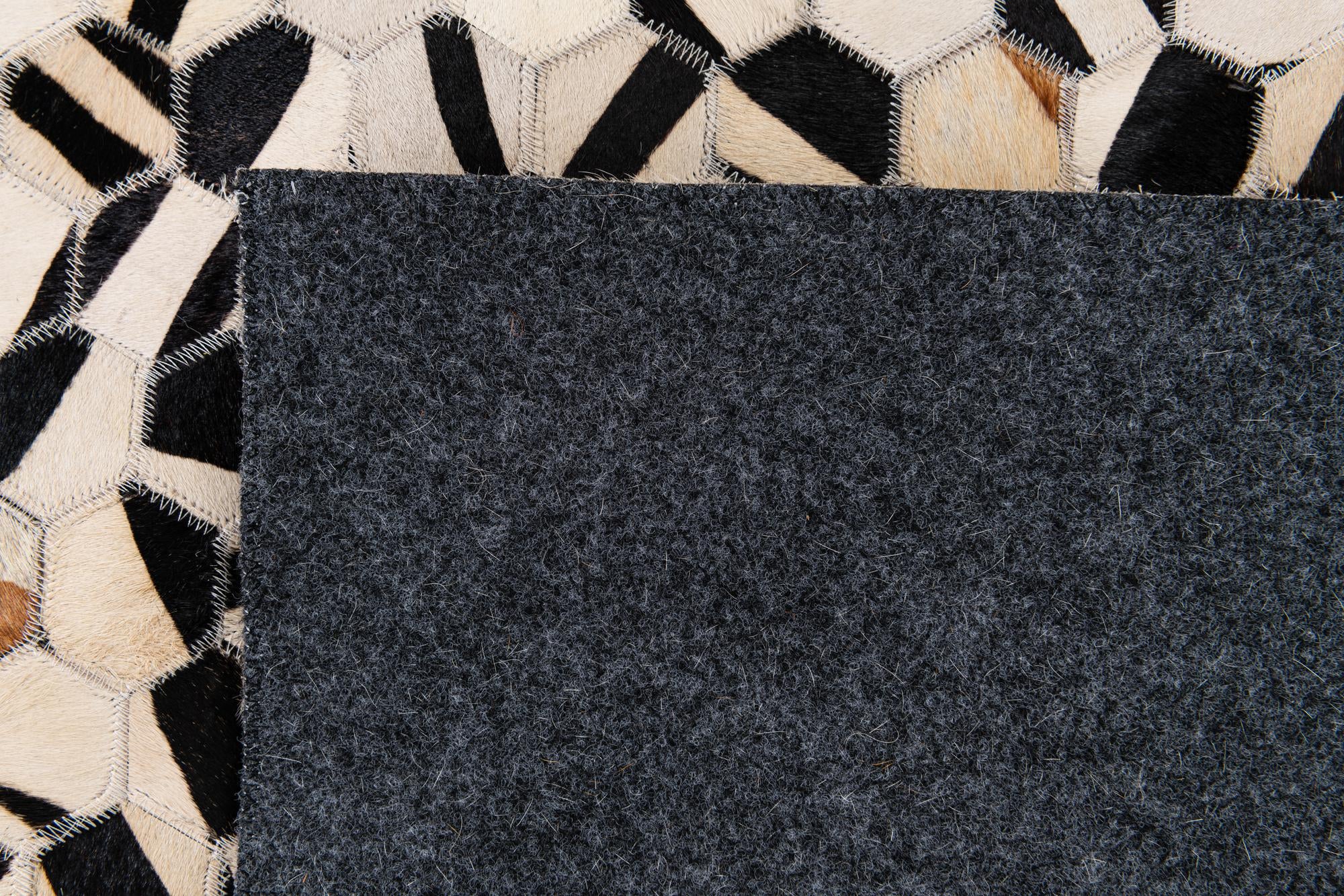 8' 1 x 9' 10 Cowhide Stocks Rug