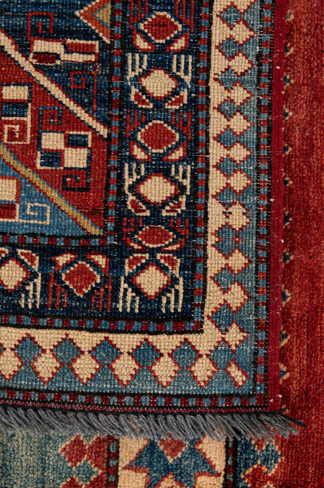 7' 1 x 10' 3 Hand Knotted Kazak Wool Rug