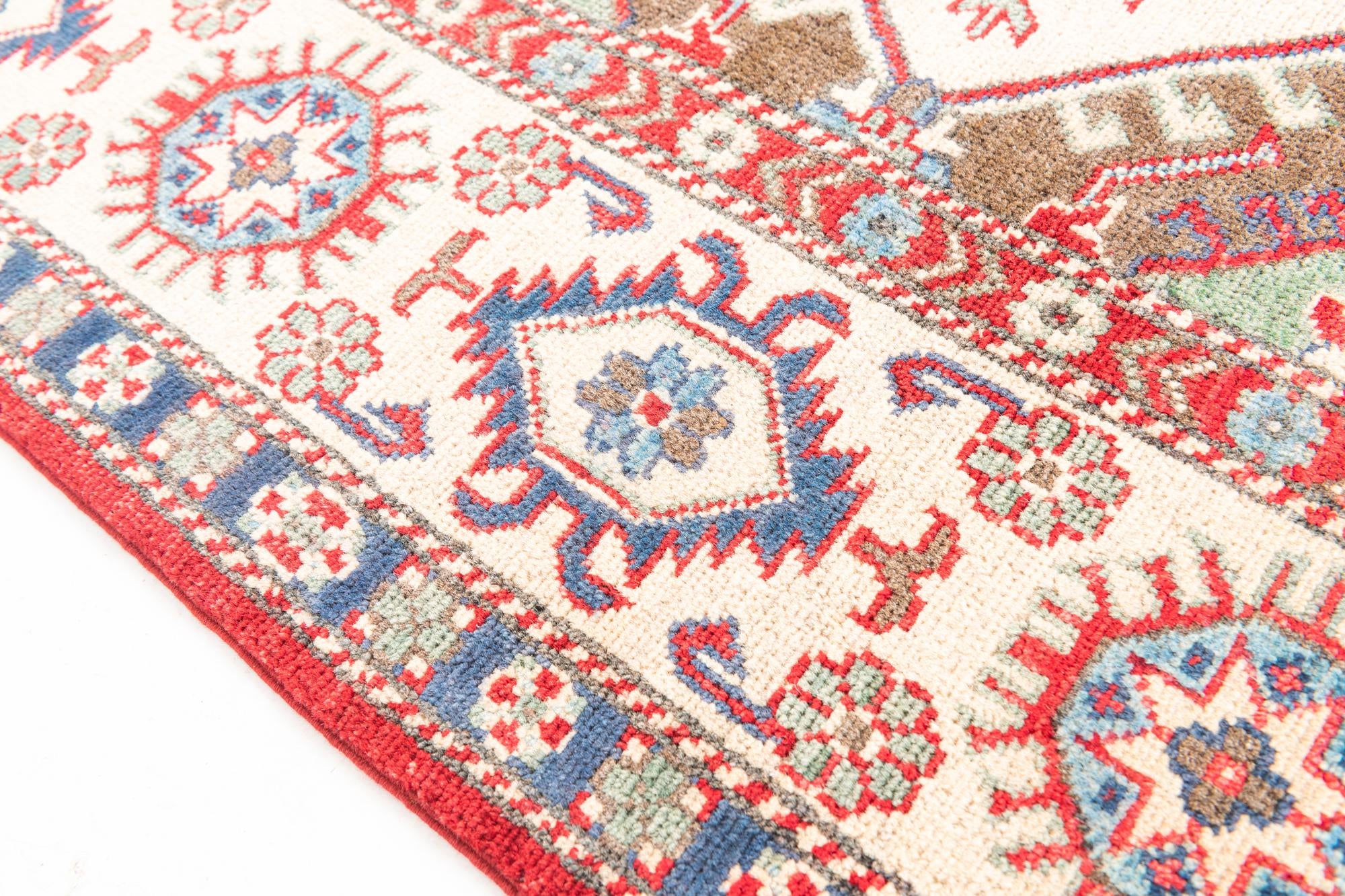 6' x 9' 1 Hand Knotted Kazak Rug