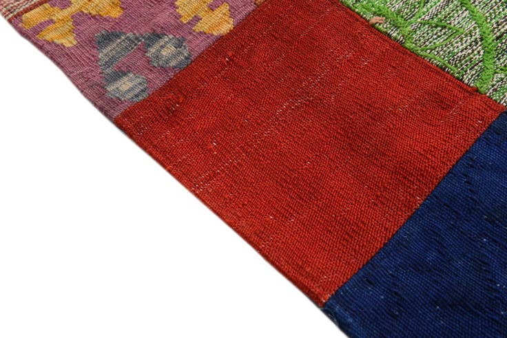 Detail image of 4' 2 x 5' 10 Hand Woven Kilim Patchwork Wool Rug