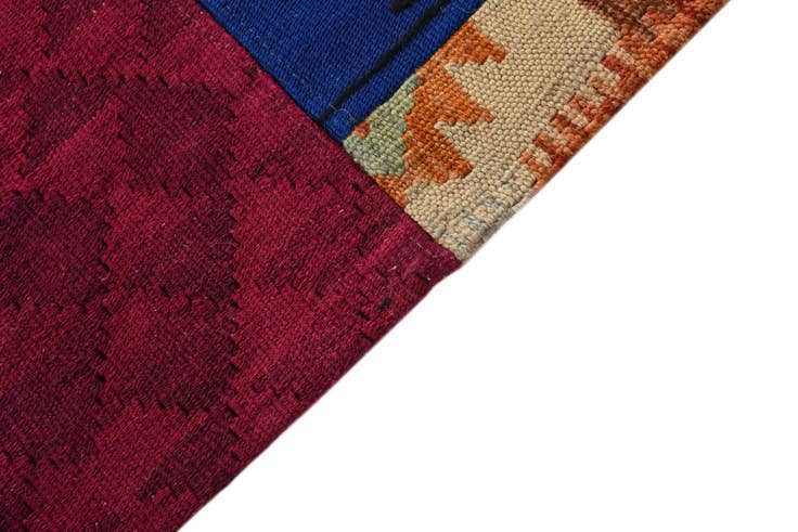 Detail image of 4' 9 x 6' 7 Hand Woven Kilim Patchwork Wool Rug