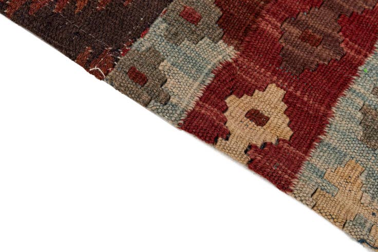 Detail image of 5' 10 x 8' 1 Hand Woven Kilim Patchwork Wool Rug