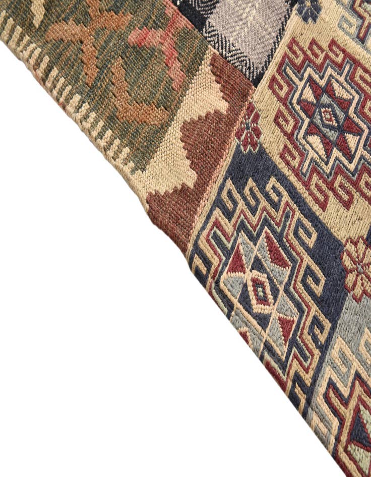 Detail image of 5' 5 x 8'  Hand Woven Kilim Patchwork Wool Rug