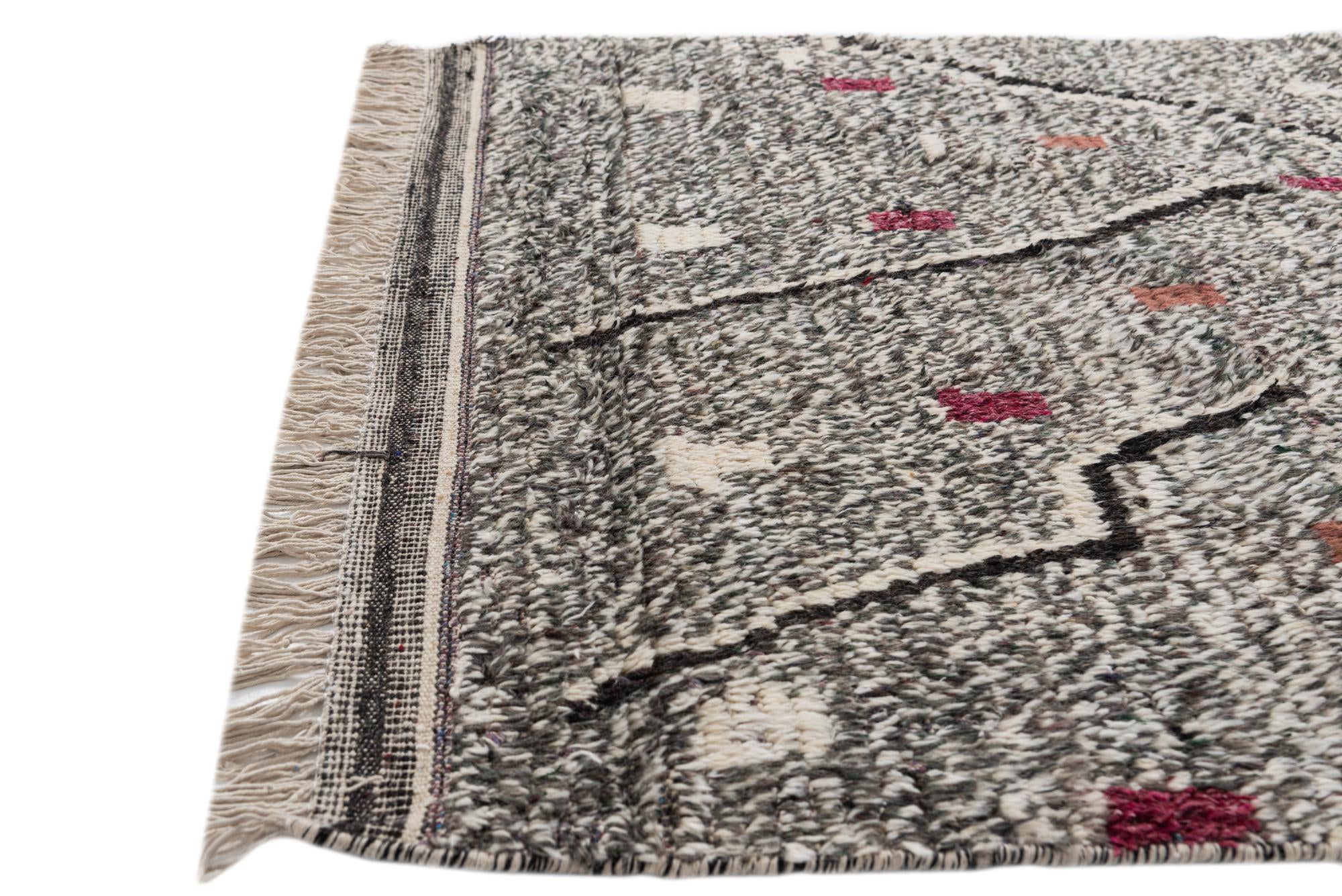 4' 2 x 6' 9 Hand Knotted Moroccan Wool Rug