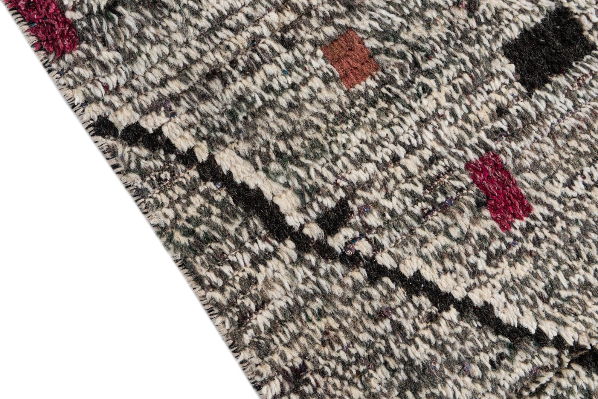 4' 2 x 6' 9 Hand Knotted Moroccan Wool Rug