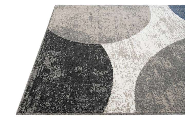 5' 3 x 7' 8 Spectrum Rug