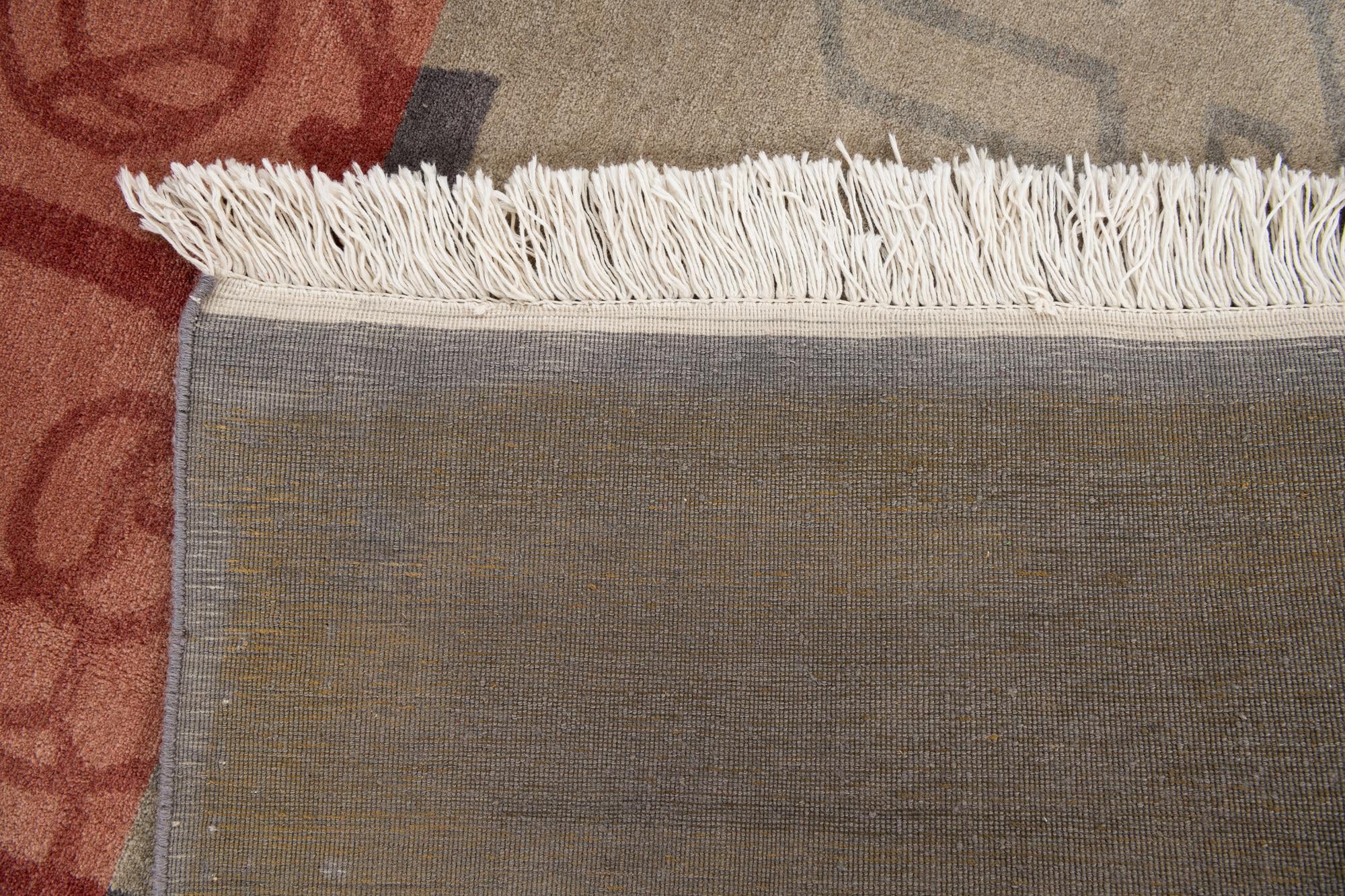 6' 6 x 9' 1 Hand Knotted Tibet Wool Rug