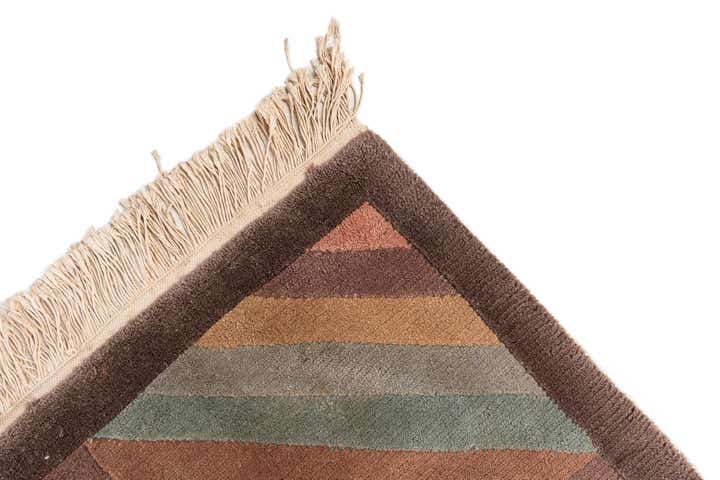 5' 6 x 8' 1 Hand Knotted Tibet Wool Rug