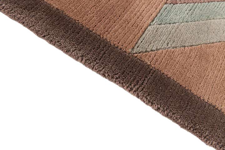 5' 6 x 8' 1 Hand Knotted Tibet Wool Rug