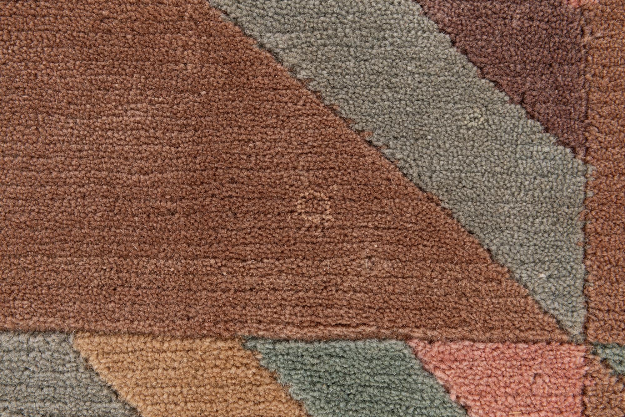 5' 6 x 8' 1 Hand Knotted Tibet Wool Rug