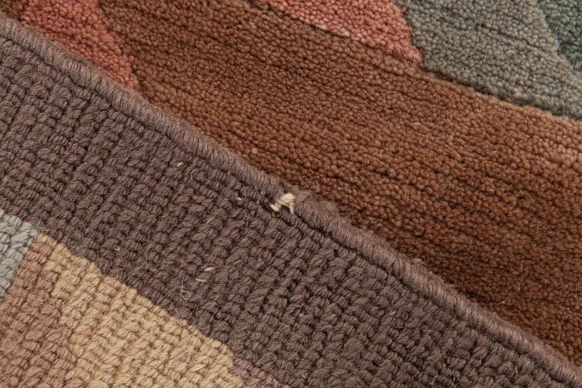 5' 6 x 8' 1 Hand Knotted Tibet Wool Rug