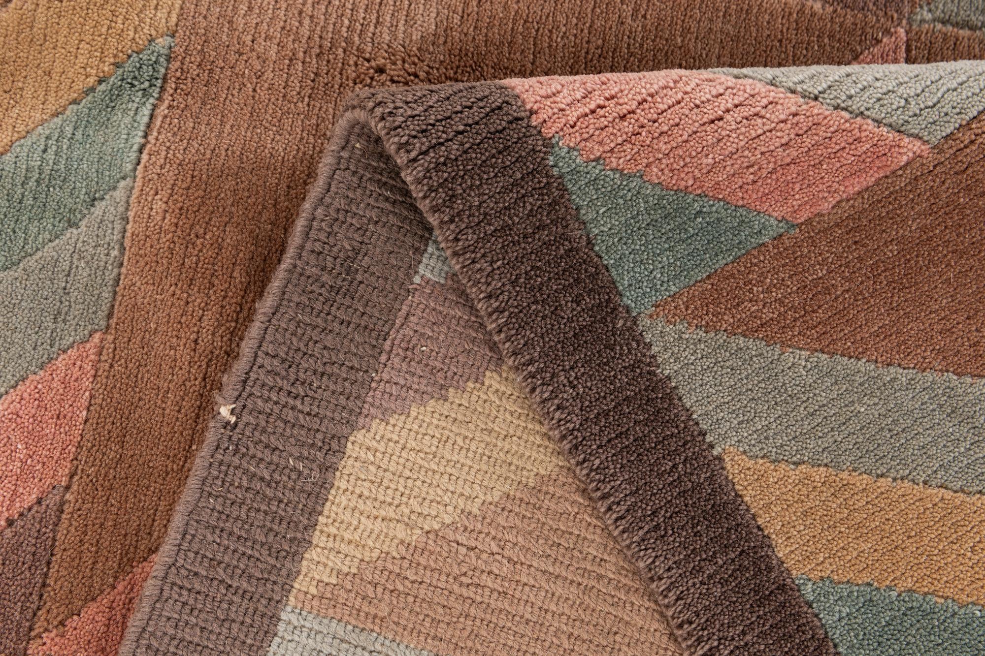 5' 6 x 8' 1 Hand Knotted Tibet Wool Rug