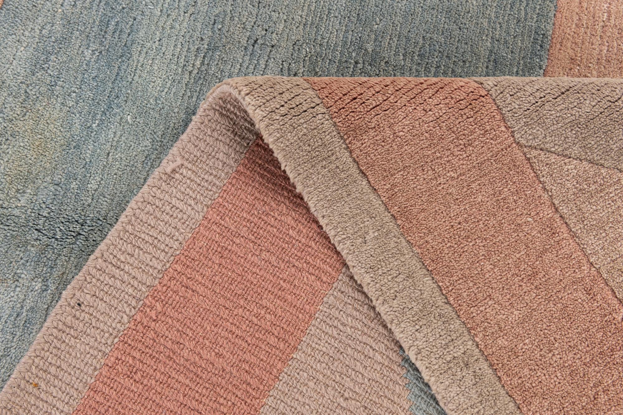 5' 8 x 7' 9 Hand Knotted Tibet Wool Rug