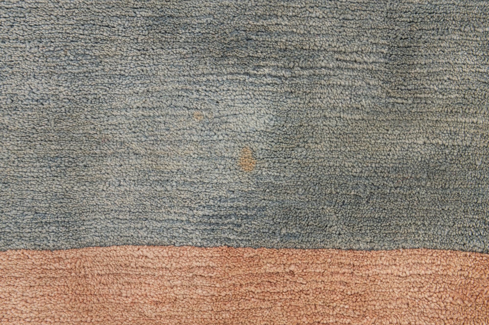 5' 8 x 7' 9 Hand Knotted Tibet Wool Rug
