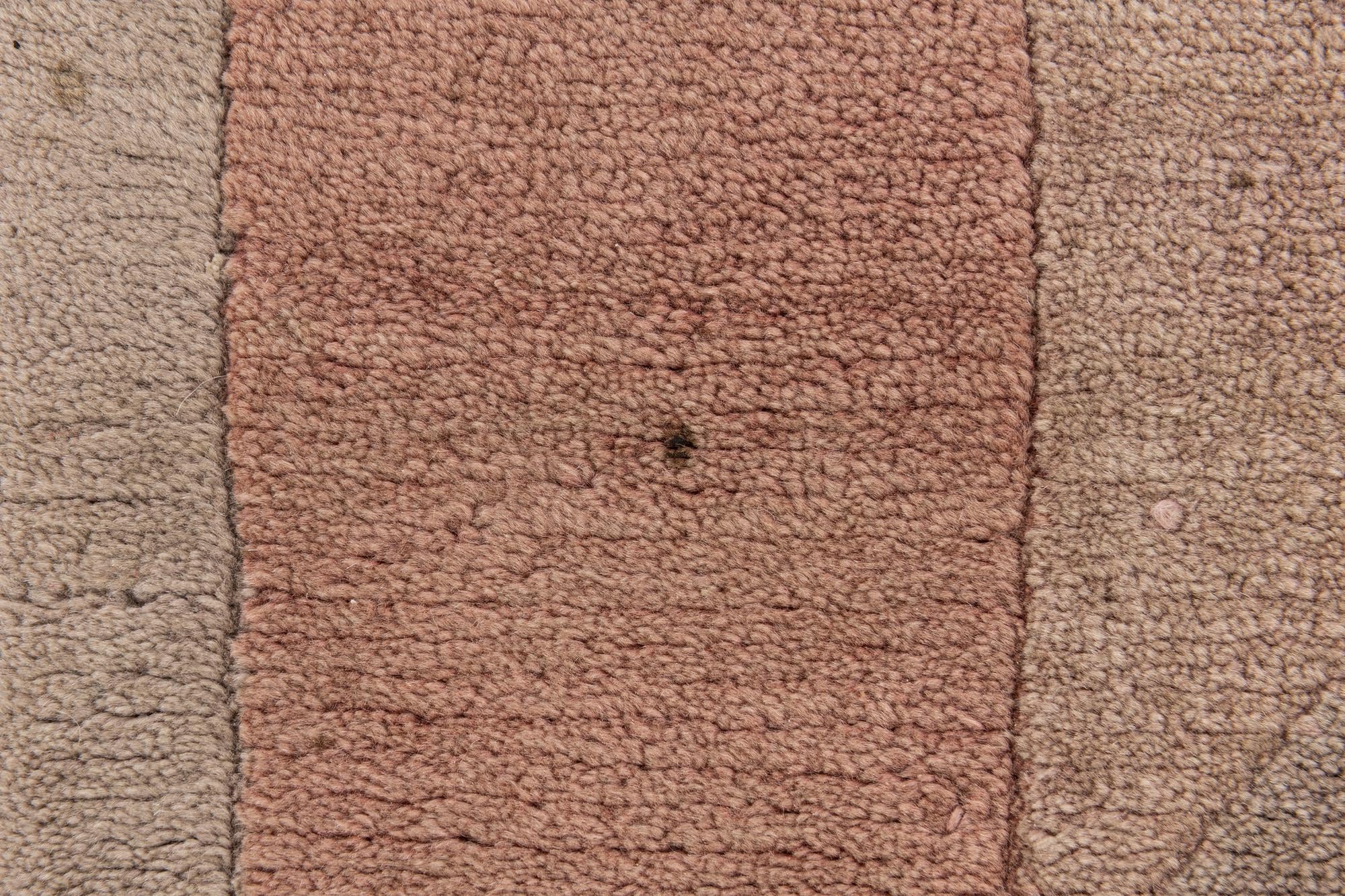 5' 8 x 7' 9 Hand Knotted Tibet Wool Rug