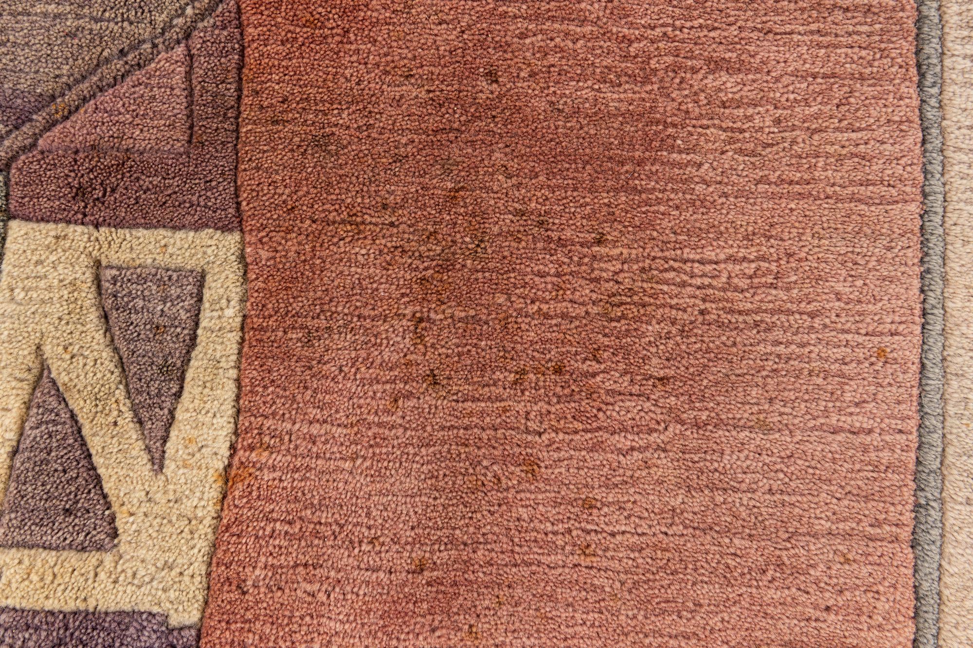 5' 9 x 8' Hand Knotted Tibet Wool Rug