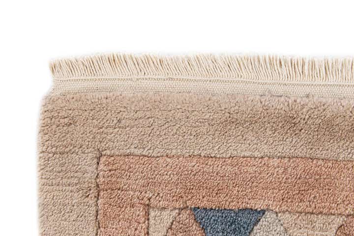 4' 7 x 6' 4 Hand Knotted Tibet Wool Rug