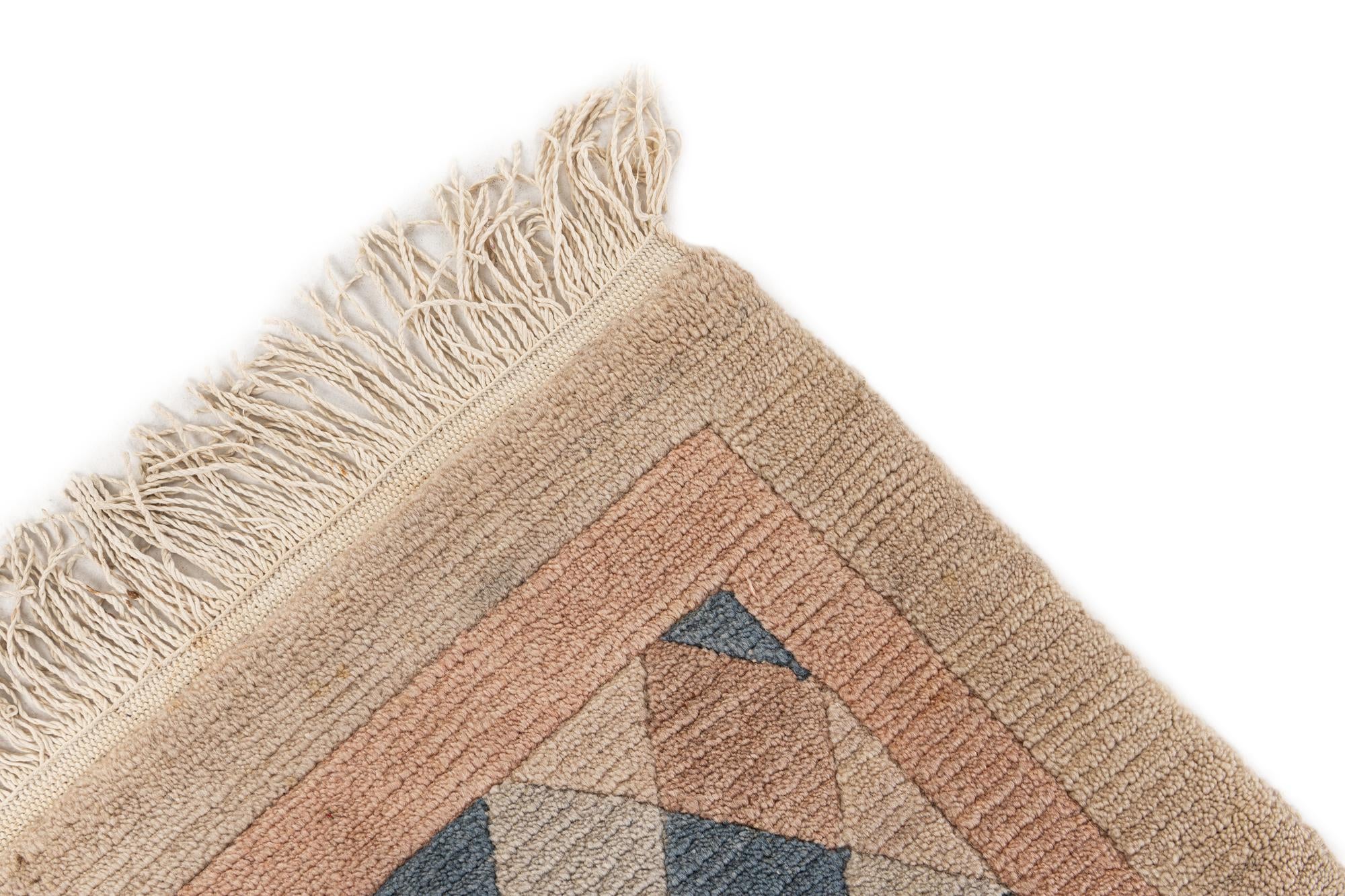 4' 7 x 6' 4 Hand Knotted Tibet Wool Rug