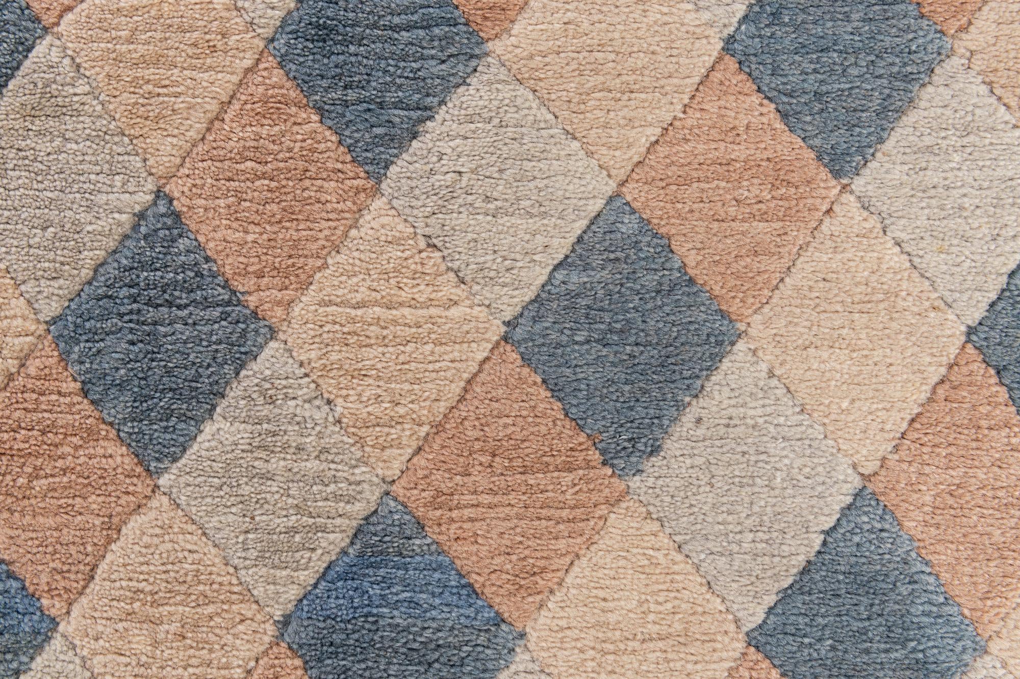 4' 7 x 6' 4 Hand Knotted Tibet Wool Rug